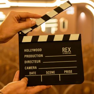 clap de cinéma à l'effigie du grand rex studio, produits dérivés du cinema