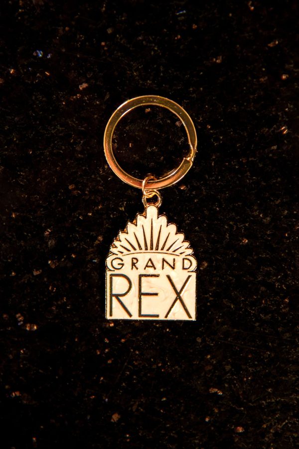 Porte-clés "Grand Rex" de couleur nacrée, produit dérivé du cinéma parisien